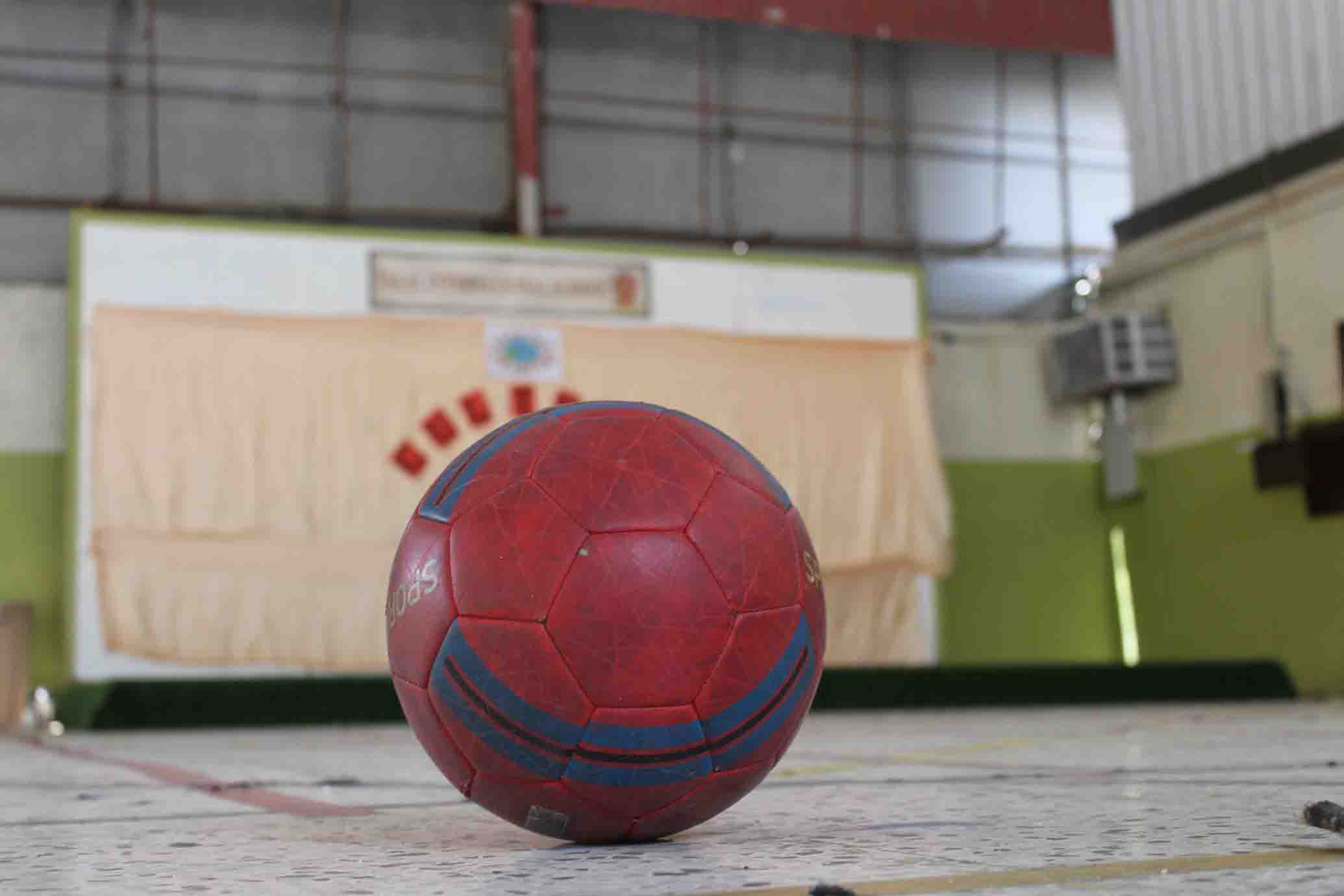 A soccer ball on a green field